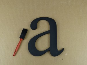 Painted wooden letter ready to hang